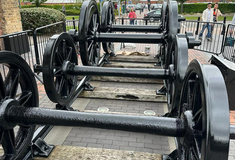 a set of old train wheels repainted and restored by Cook's Decorating